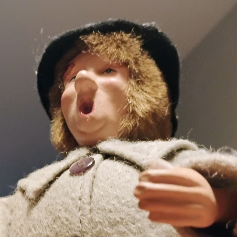 A weird Victorian man doll going :O