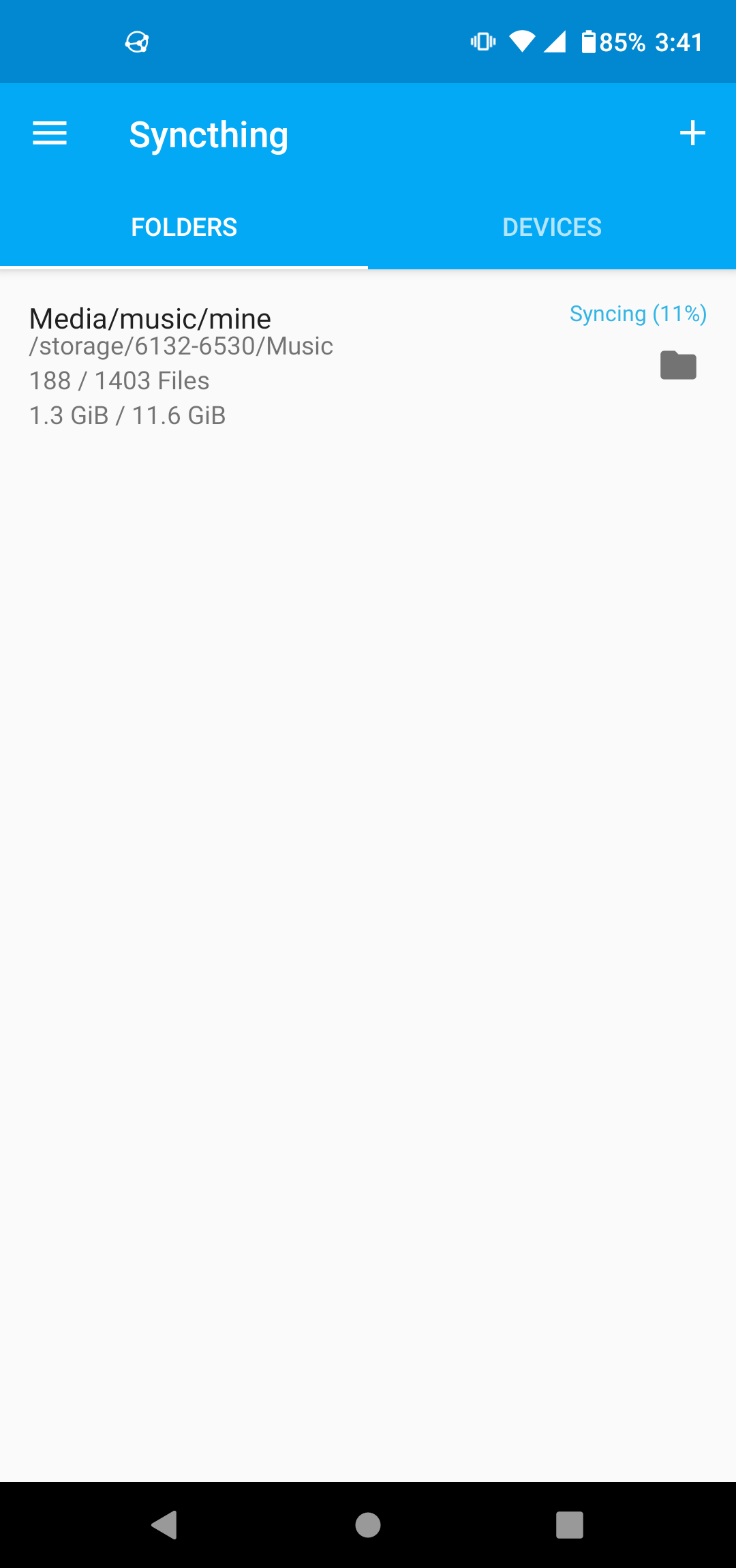 A screenshot of the Syncthing Android app. It shows that syncing of Media/music/mine is 11% complete. The app's interface is simple and clean.