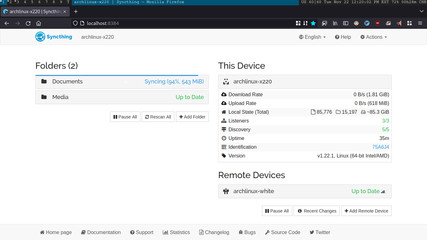 A screenshot of the Syncthing web GUI. There are two columns: on the left, one labeled "Folders (2)" lists "Documents" and "Media". Media is "Up to Date", but "Documents" is still "Syncing (94%, 543 MiB)". On the right, the column is labeled "This Device" and lists information about the device "archlinux-x220": Download Rate, Upload Rate, Local State (showing ~85.3 GiB of data), and other diagnostic information. Below that section is a section labeled "Remote Devices" showing that "archlinux-white" is "Up to Date".